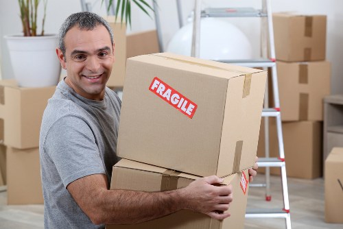 Moving van and packed boxes for local removals in Stjohns